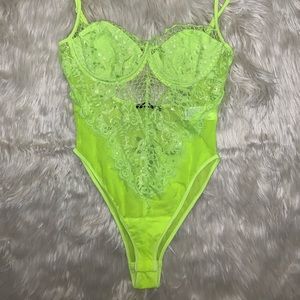 Neon green bodysuit.